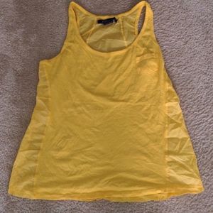Miley Cyrus yellow tank
